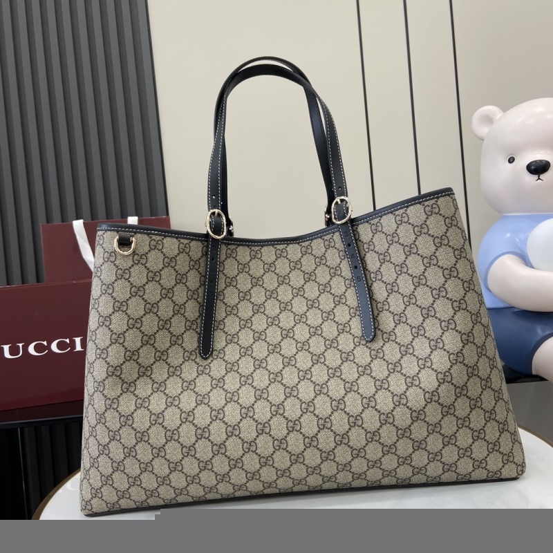 G*u*i shopping bags